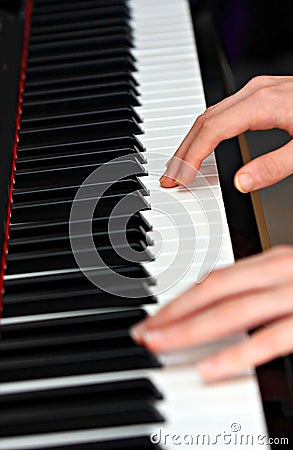 Person playing piano Stock Photo