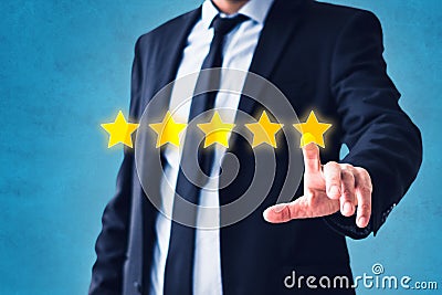 Person pointing on 5 star review, costumer feedback concept - five stars rating Stock Photo