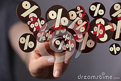 Person presenting the virtual projection of percent signs - sale or discount concept Stock Photo