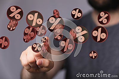 Person presenting the virtual projection of percent signs - sale or discount concept Stock Photo