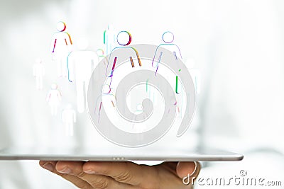 Person presenting a virtual projection of social networking Stock Photo