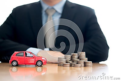 Person Protecting Increasing Coins And Car Stock Photo