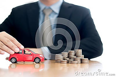 Person Protecting Increasing Coins And Car Stock Photo