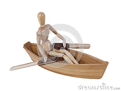 Person Rowing in a Wooden Boat Stock Photo