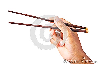 Person `s right hand using bamboo chopsticks. Stock Photo