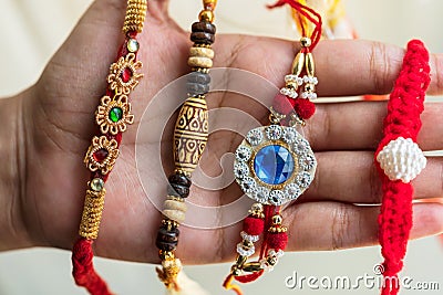 Various Rakhi Showing On A Hand Stock Photo