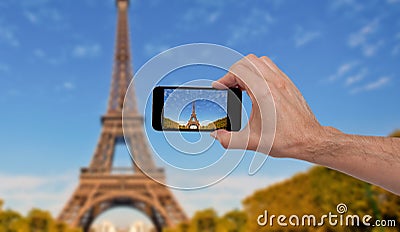 Person taking a photo in Paris Stock Photo