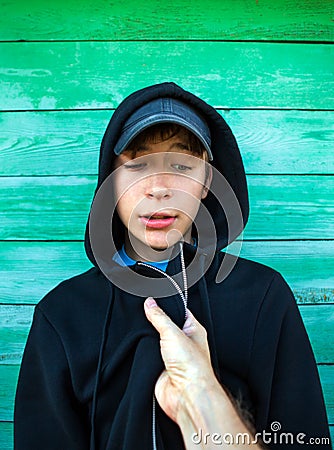 Person Threaten a Teenager Stock Photo