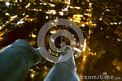 Person on top of a skyscraper Stock Photo