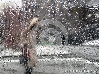 Person under rain Stock Photo