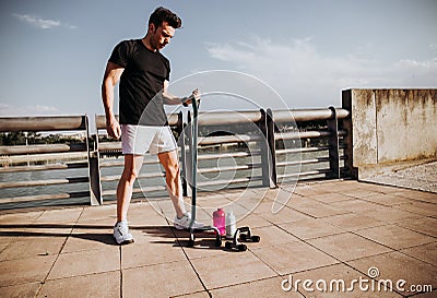 A person using different sports accessories to train anywhere Stock Photo