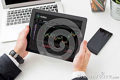 Person using Forex trading software Stock Photo