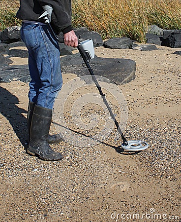 Person using metal detector Stock Photo