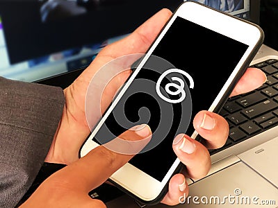Person Using Threads mobile application on mobile, newly launched social media mobile app concept editorial. Editorial Stock Photo