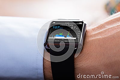 Person Wearing Smart Watch Showing Heartbeat Rate Stock Photo