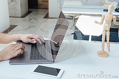 A person working from home to reduce the chance of COVID-19 coronavirus Stock Photo