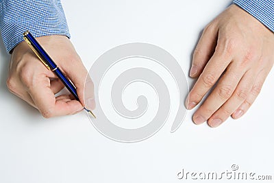 Person writing on paper Stock Photo