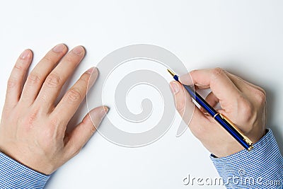Person writing on paper Stock Photo