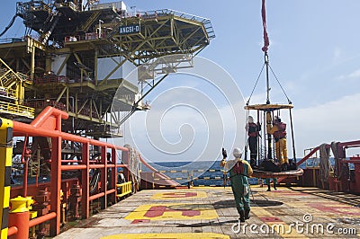 Personal basket transfer at oil platform Editorial Stock Photo