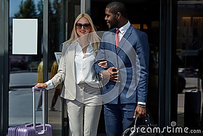 Personal bellboy accompanies the client, helps with luggage Stock Photo