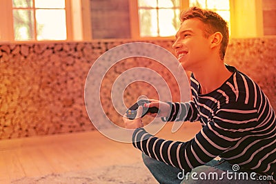 Joyful merry guy challenging in console game Stock Photo