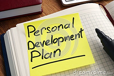 Personal development plan. Memo stick in the notepad Stock Photo