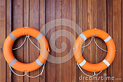 Personal flotation device hanging on the wall Stock Photo