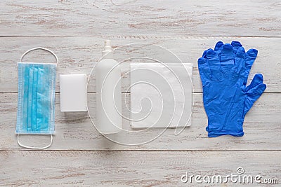 Personal medical protective equipment, mask, sterile gloves, and disinfectants for virus protection Stock Photo