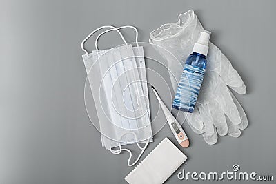 Antiviral personal protective equipment during quarantine, medical masks, gloves, antibacterial hand spray Stock Photo