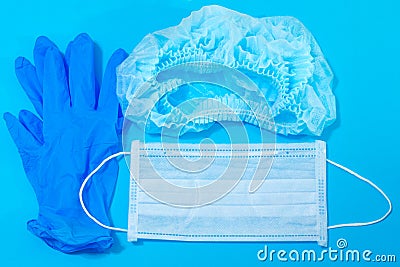 Personal protective equipment - medical mask, hat, rubber gloves Stock Photo