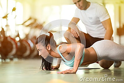Personal trainer with his client Stock Photo