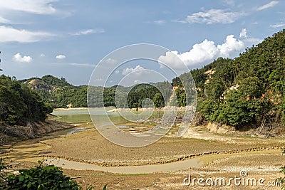 Launching a small boat in a reservoir in china with tricycle Stock Photo