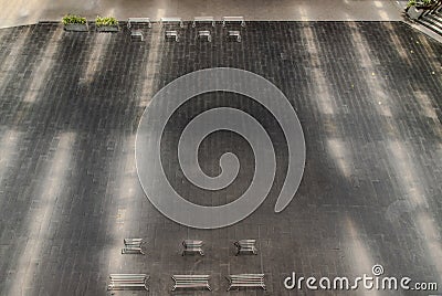 Perspective outdoor white metal benchs in open empty space area of the park Stock Photo