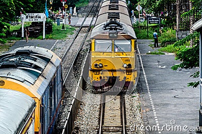 Perspective of Thai Red Sprinter train, Diesel locomotive. Editorial Stock Photo