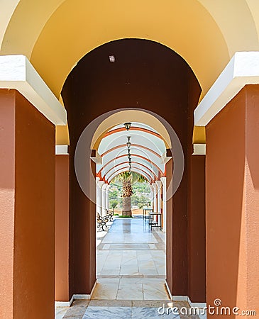 Perspective view of an arched passage in the ancient monastery Stock Photo