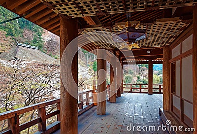 Perspective view of a beautiful garden through the corridor Kairou of a temple famous for cherry blossom trees Stock Photo