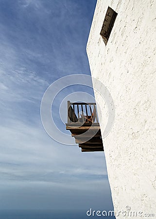 Balcony on a white building Stock Photo