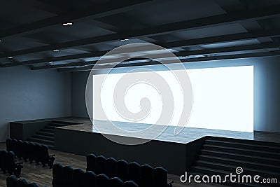 Perspective view on big blank white illuminated screen with place for your text or logo and blue backlit in empty huge hall with Stock Photo