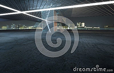 Perspective view of empty cement floor with modern steel and glass building exterior Stock Photo