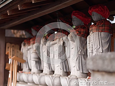 Perspective view of Roku Jizo, six Buddhist monk stone statues Stock Photo