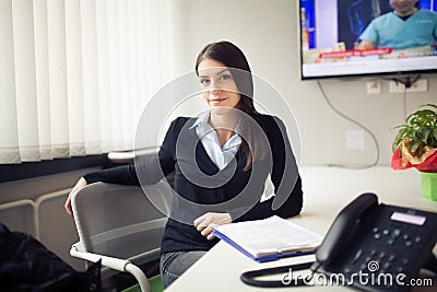 Perspective young female worker business woman day in office. Confident, smart and organized assistant. Managing business. Consult Stock Photo