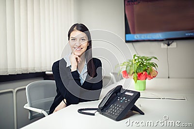 Perspective young female worker business woman day in office.Confident,smart and organized assistant.Managing business Stock Photo