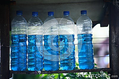 The local sell Pertalite in plastic bottles, the new type of gasoline in Indonesia Stock Photo