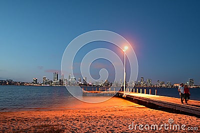 Perth central business district skyline as view from the Swan river bank pier at dusk Editorial Stock Photo