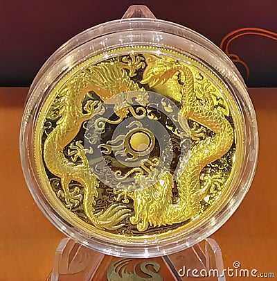 Perth Mint Double Dragons Gold Proof High Relief Coin Precious Metals Investment Chinese Mythology Animal Treasure Stock Photo