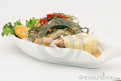 Peru Dish: Cebiche (ceviche) on sea urchin sauce, with sweet potato (camote), corn, chili. Stock Photo