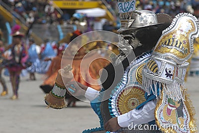 PERU, FEB 03, 2019: people with mask ,playing music and dancer in carnaval Festival of the Virgen de la Candelaria from Puno Editorial Stock Photo