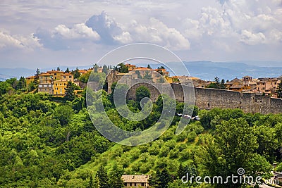 Perugia, Italy - Panoramic view of the Perugia historic quarter with medieval houses and defense walls and surrounding Umbria Editorial Stock Photo