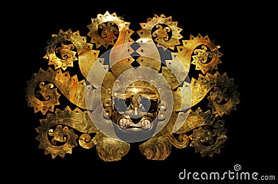 Peruvian ancient mask made out of gold and zaphire Stock Photo