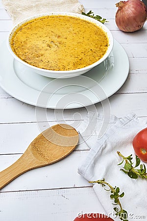 PERUVIAN FOOD, Traditional soup a La Minuta in white bowls, Top view. Stock Photo